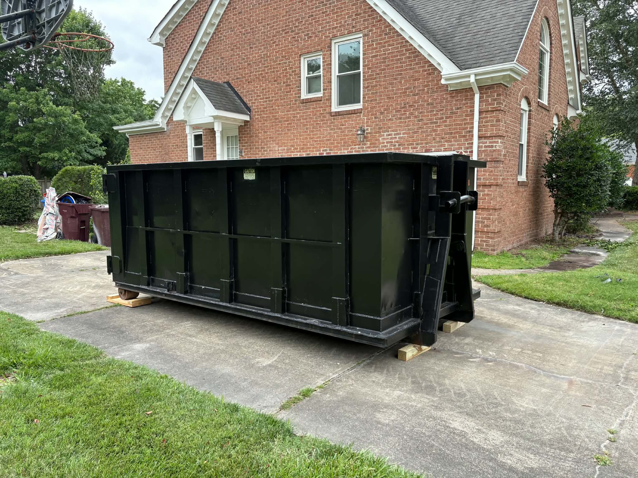 RISE Dumpsters large 20-yard commercial dumpster container for full renovations, cleanouts, and heavy waste removal.